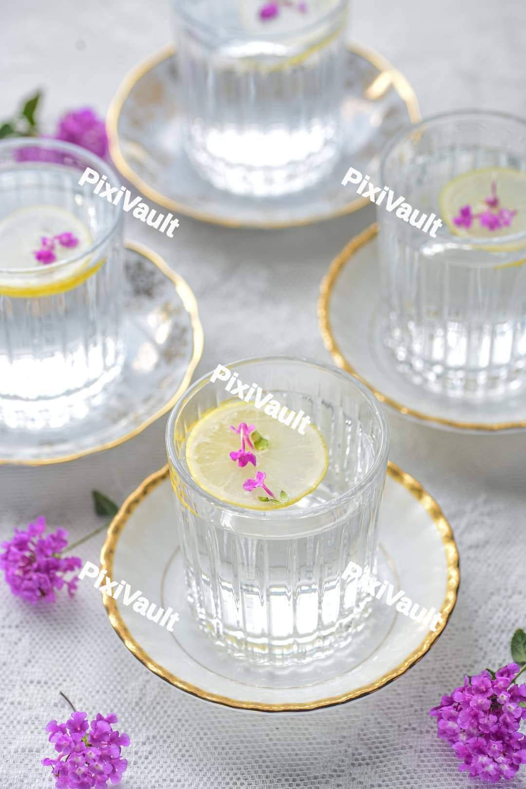 Glasses with water and a slice of lemon